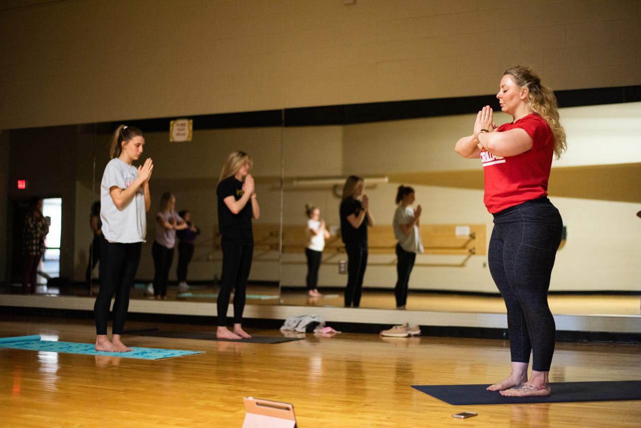 students in yoga session