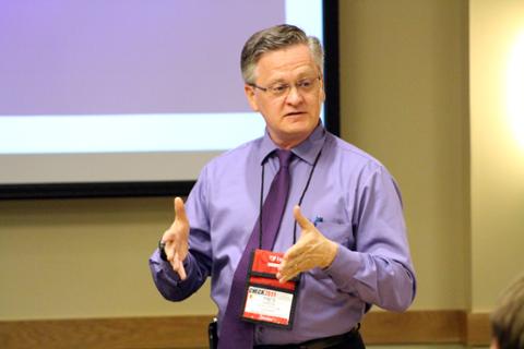 Fred Darkow's presentation on the struggles that K-State faced when their library caught fire.