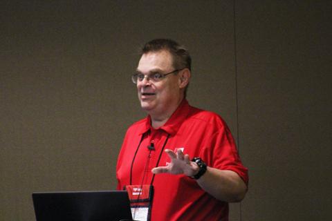 Tim Pearson giving a presentation on networking and how PSU's network handles power outages and other potential issues.
