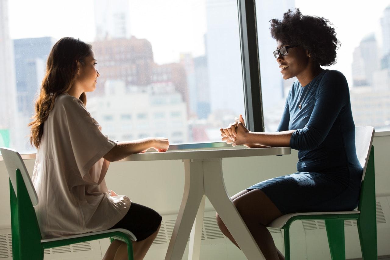 Two Professionals Communicating