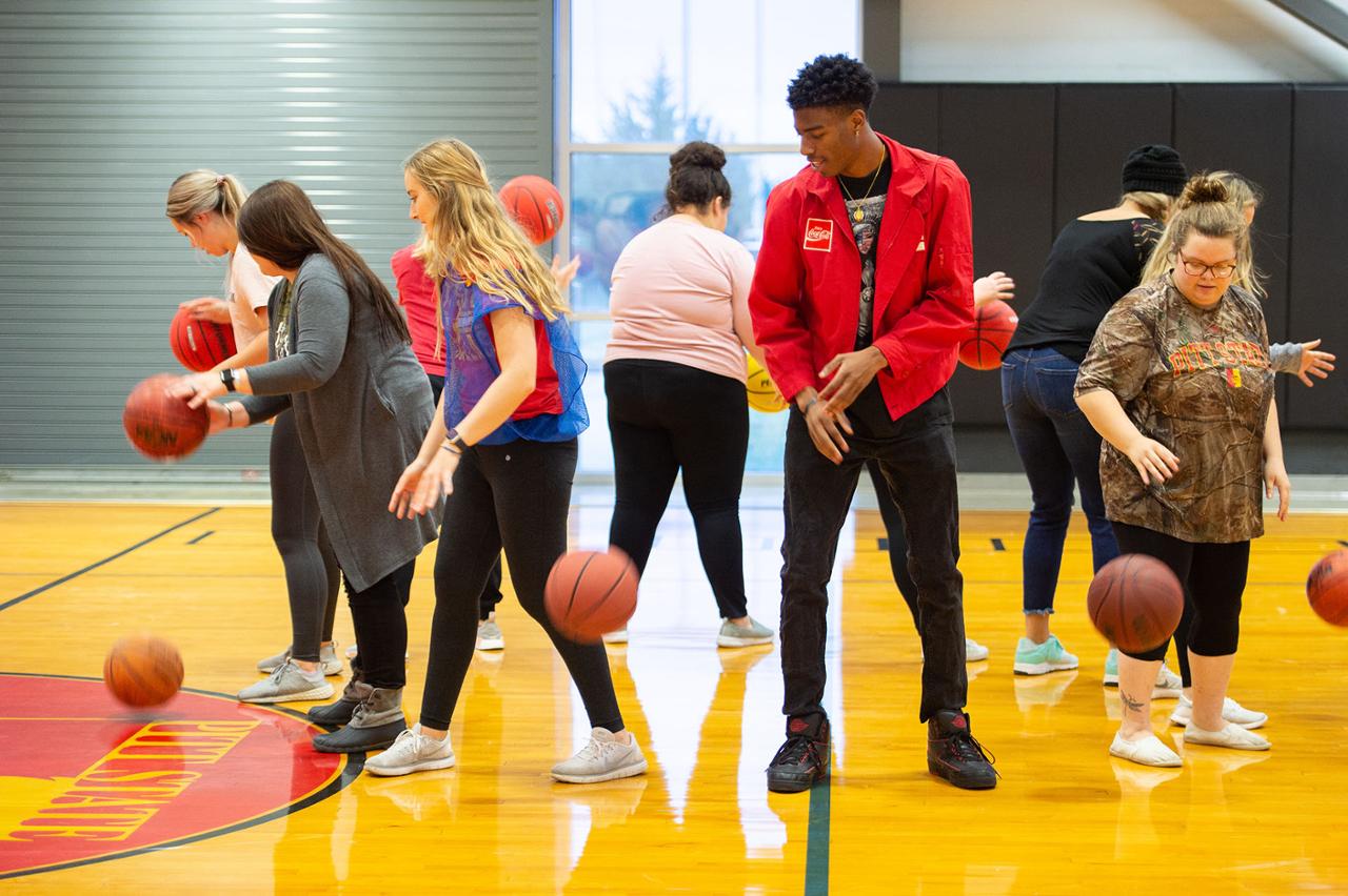 Students Playing Basketball