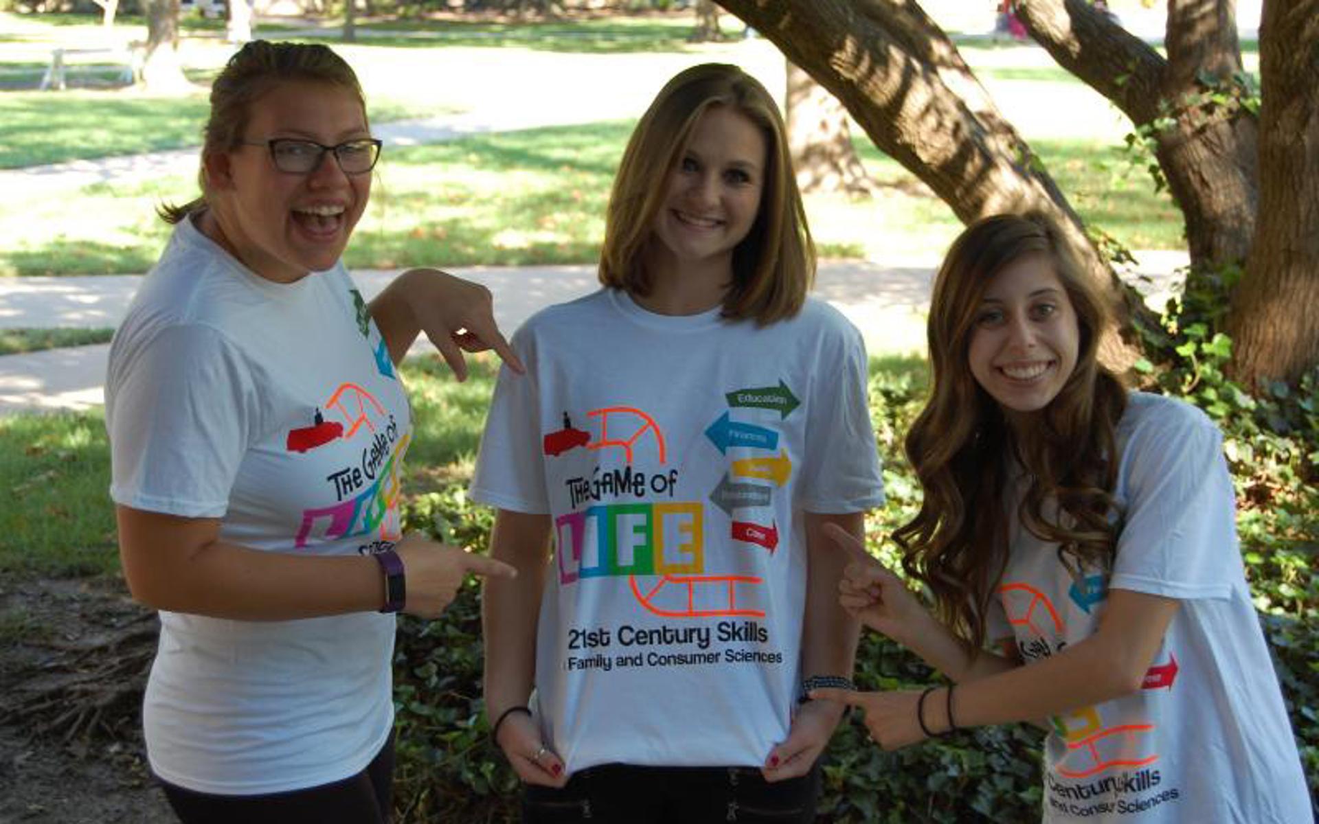 pictures of students with their KAFCS t-shirt on