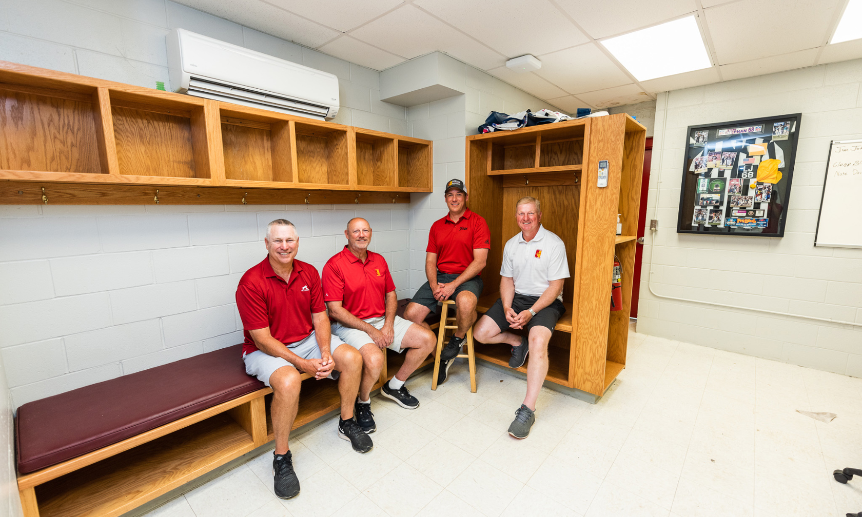 alumni in locker room