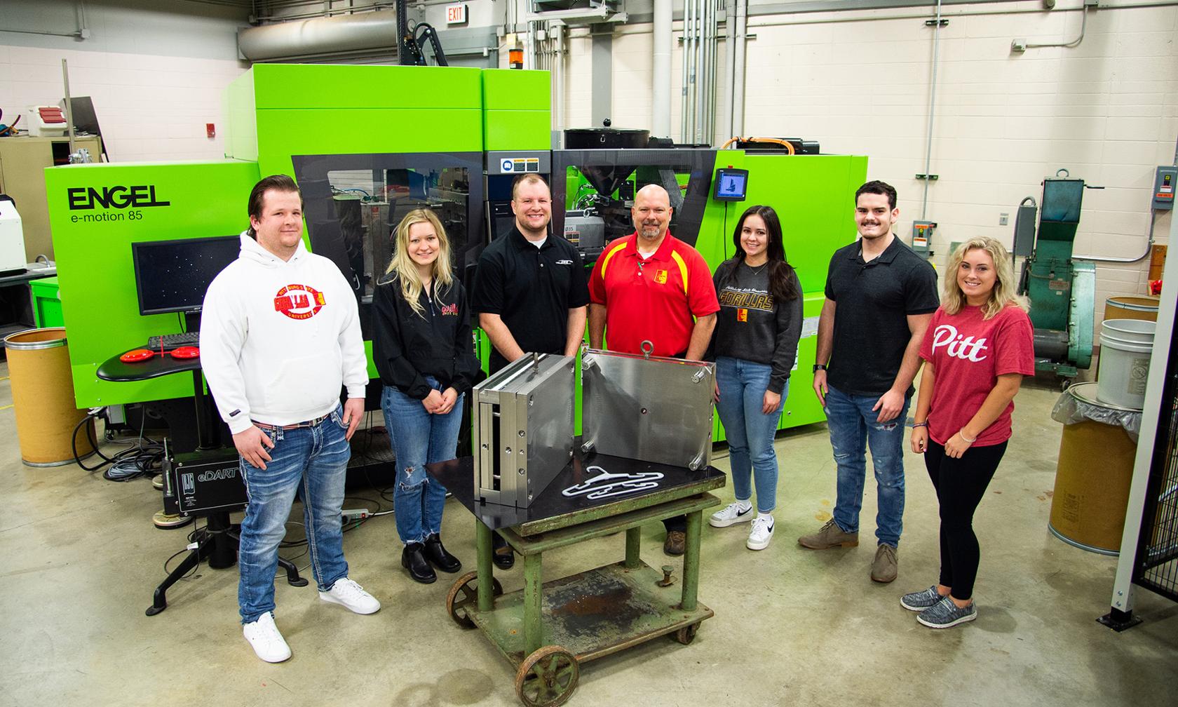 Group with donated equipment in Plastics Technology