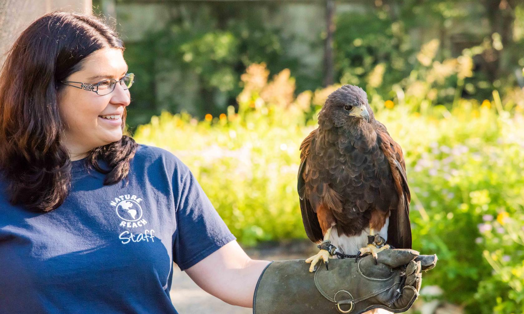 Delia Lister with a raptor