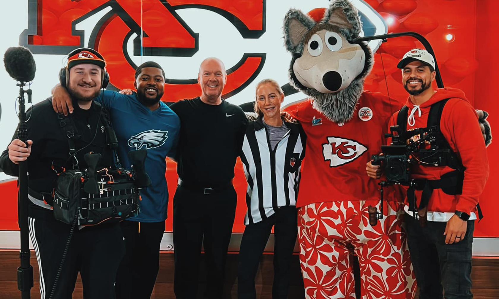 Adrian Herrera with his camera at a Chiefs game
