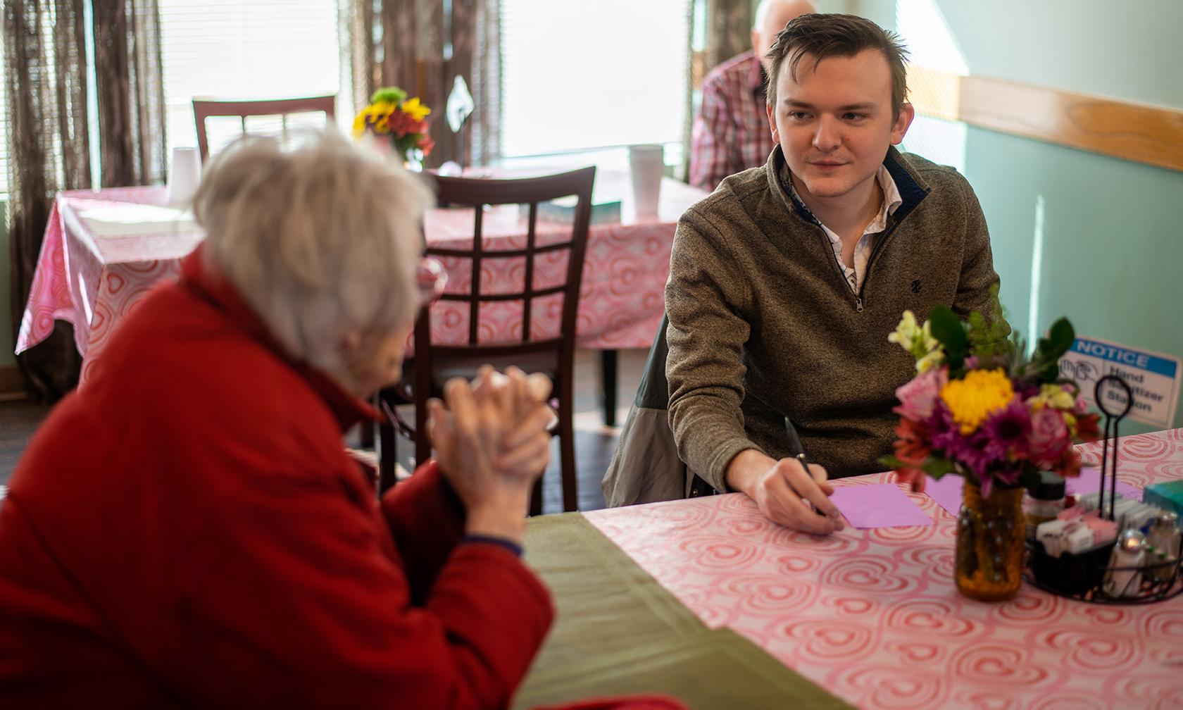 social work student working with elderly resident