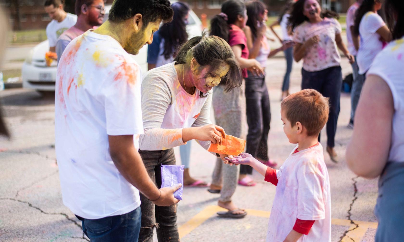 Students celebrating Holi Festival of Colors