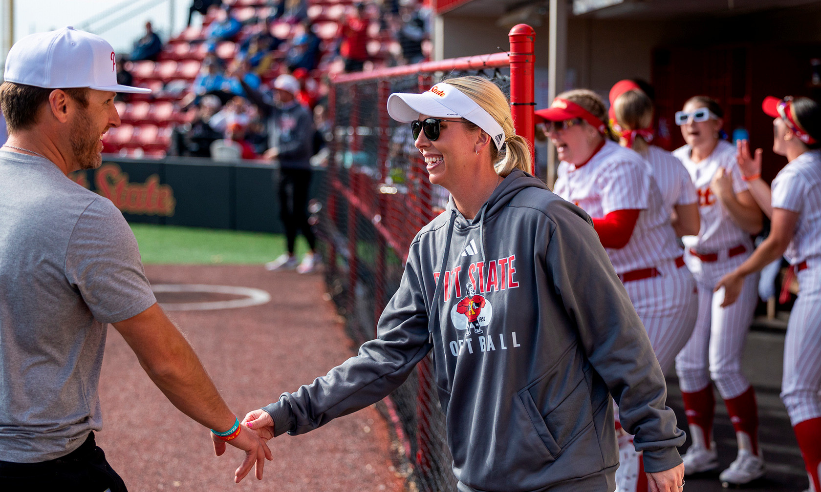 Brad and Jenny Fuller in the dugout