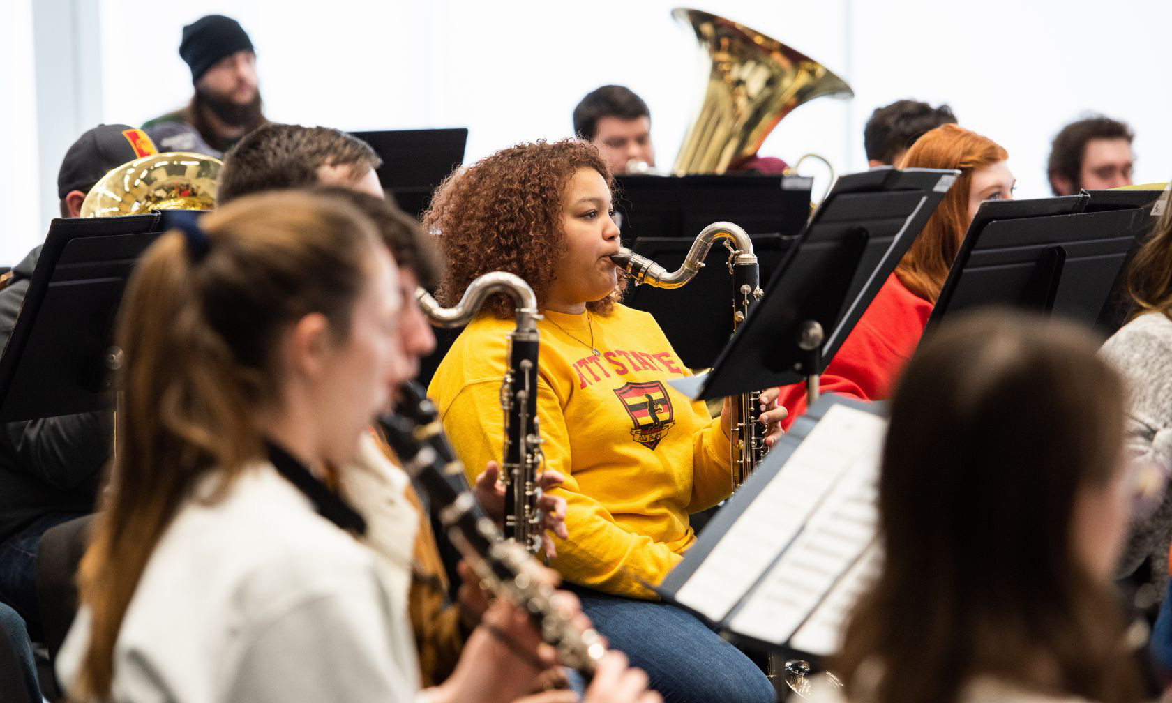 youth band members playing instruments