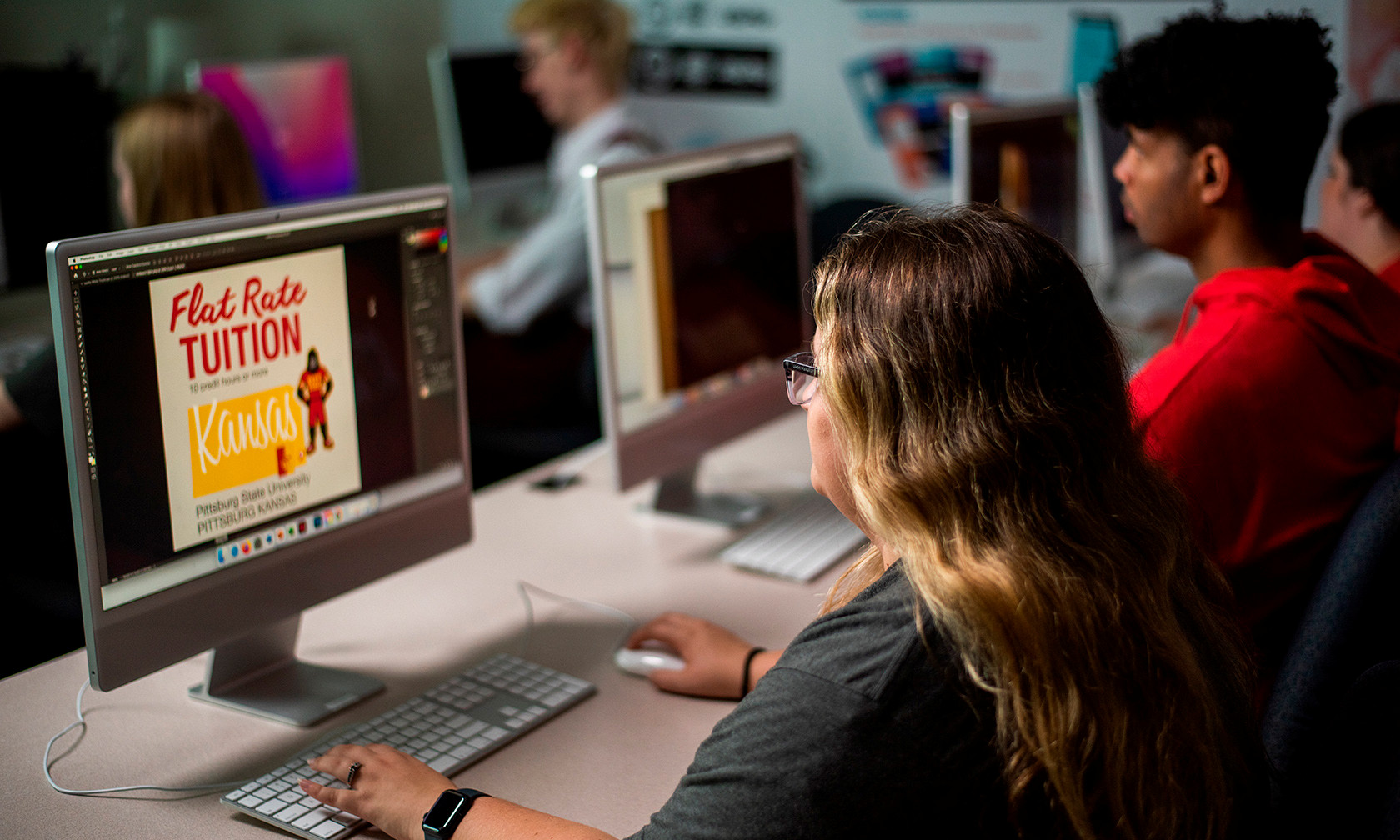 Student working on computer design