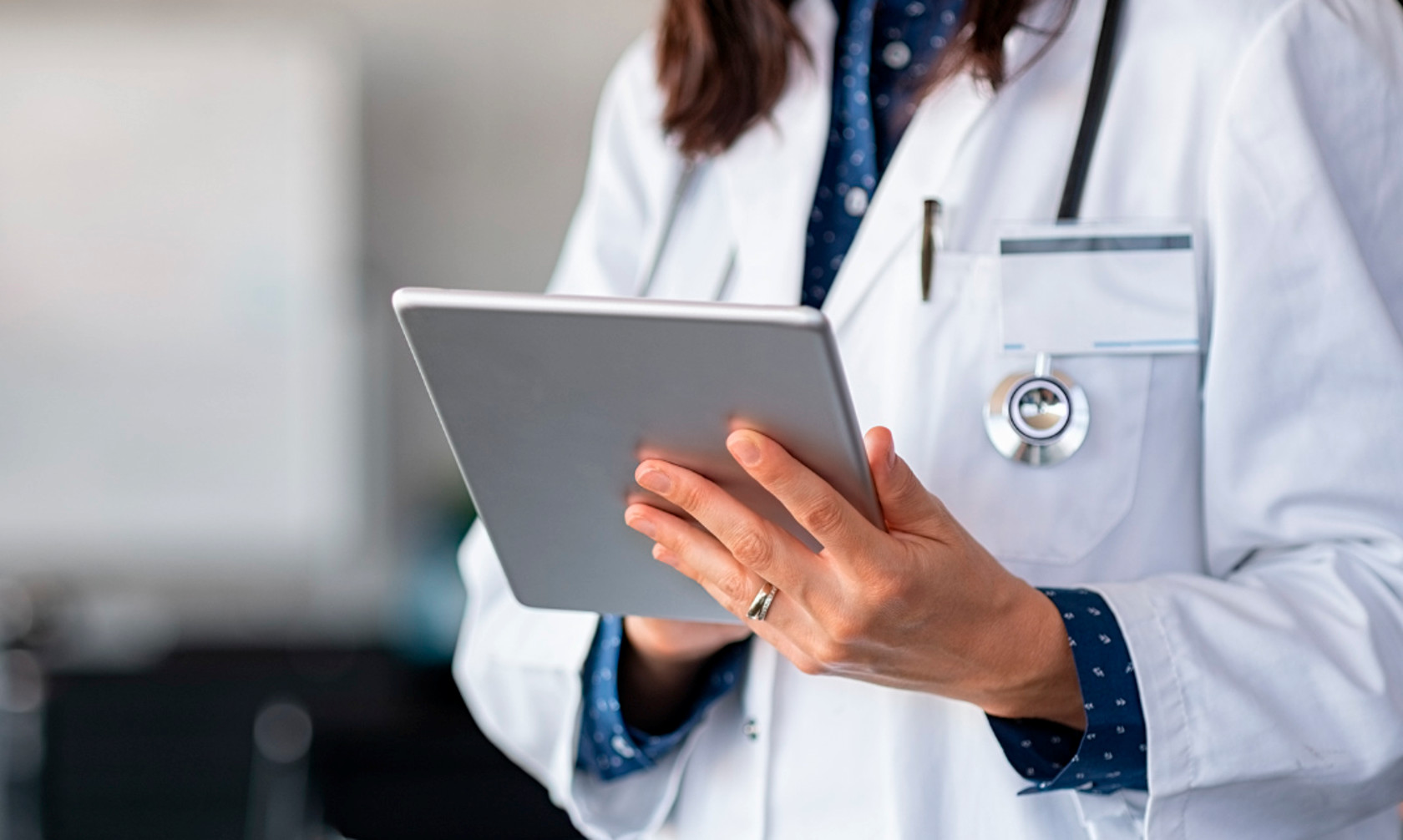 Nurse practitioner with tablet