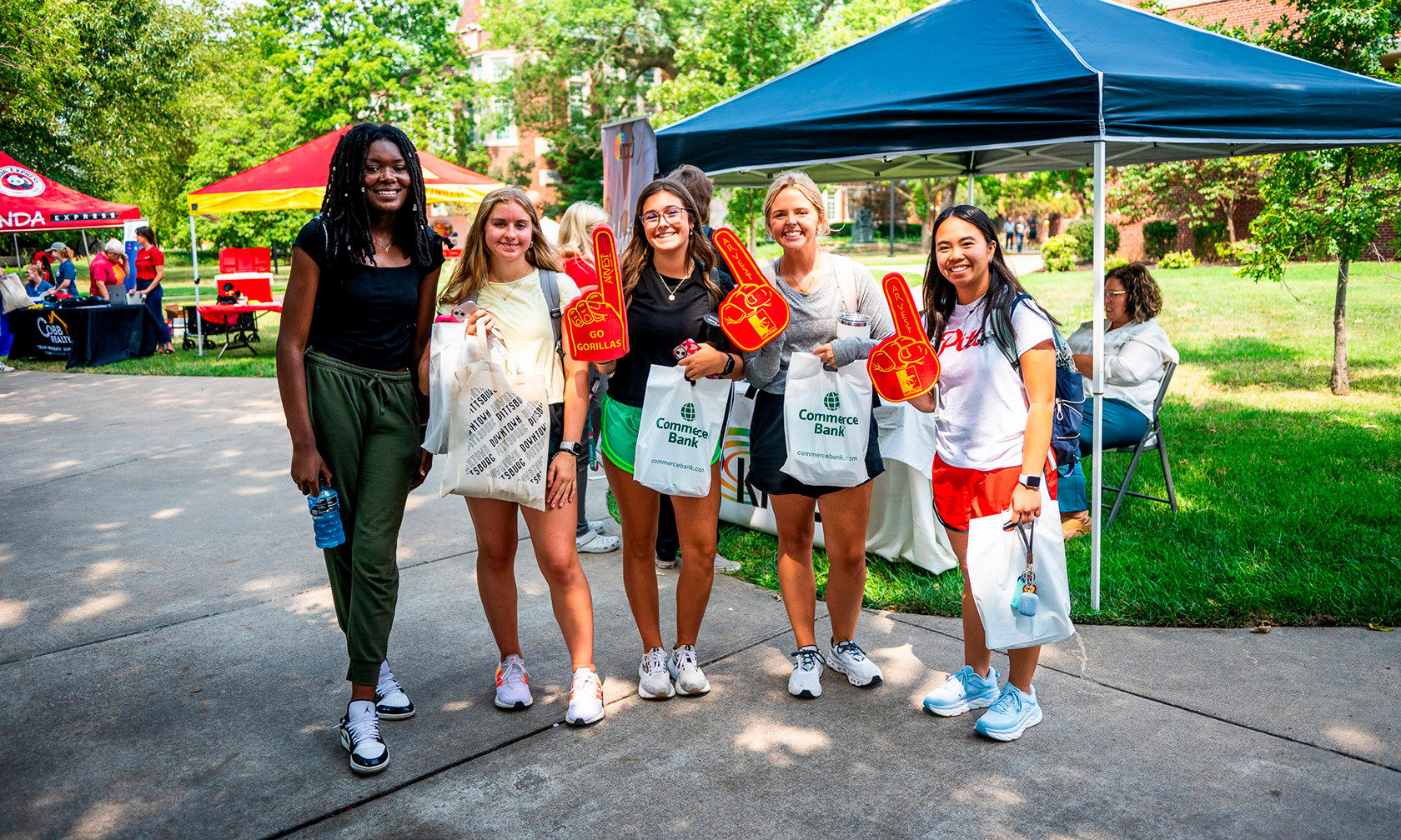 students at the community fair