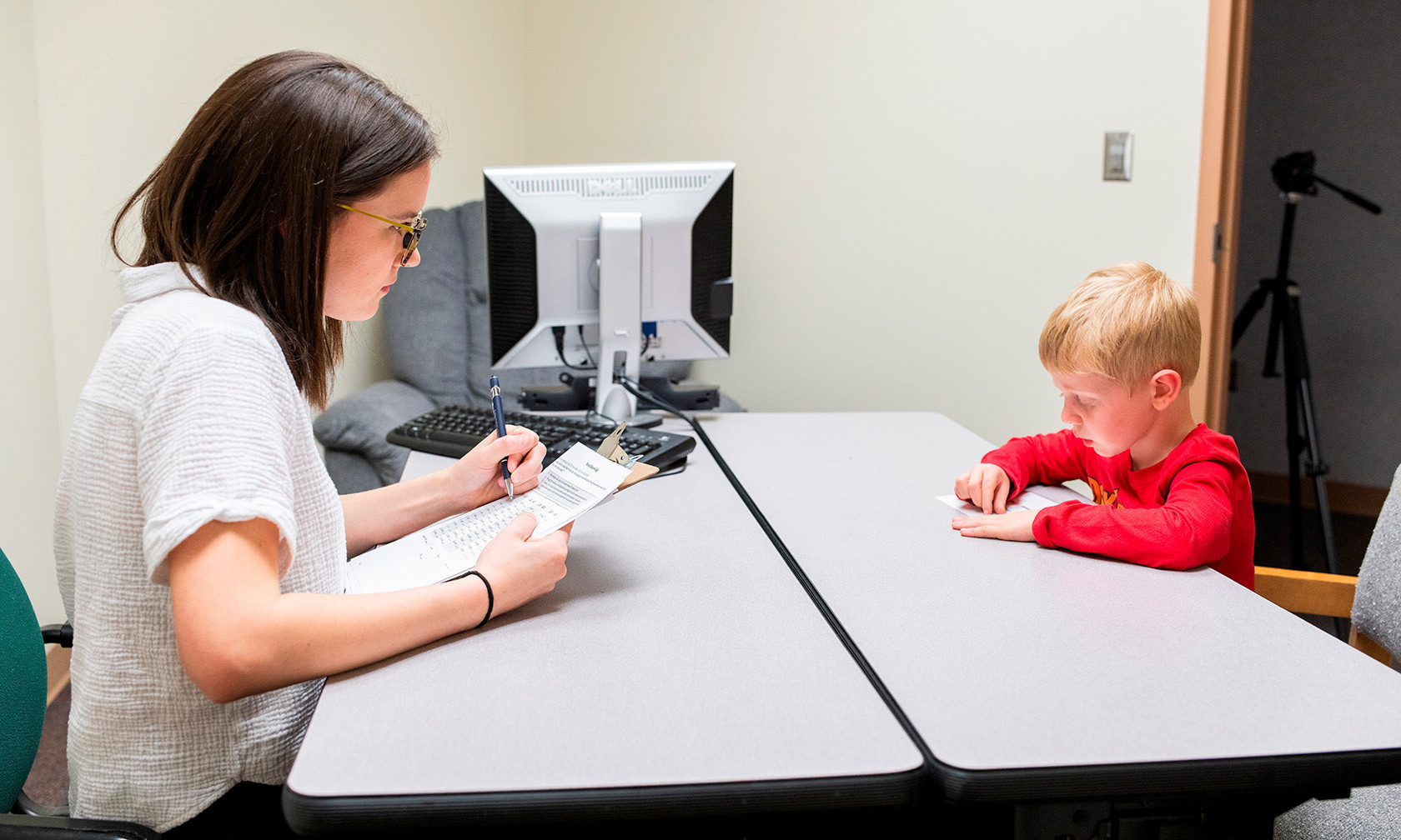 child taking reading test