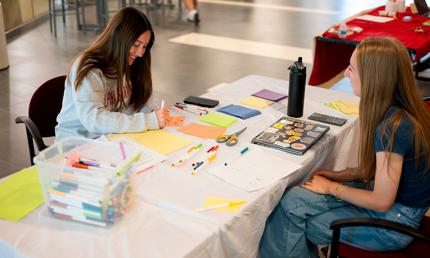 students in the overman making cards for elders in the nursing homes