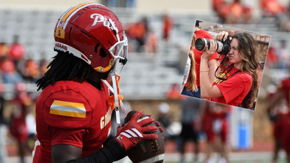 football player and student photographer