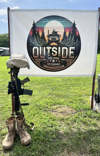 outside the wire banner