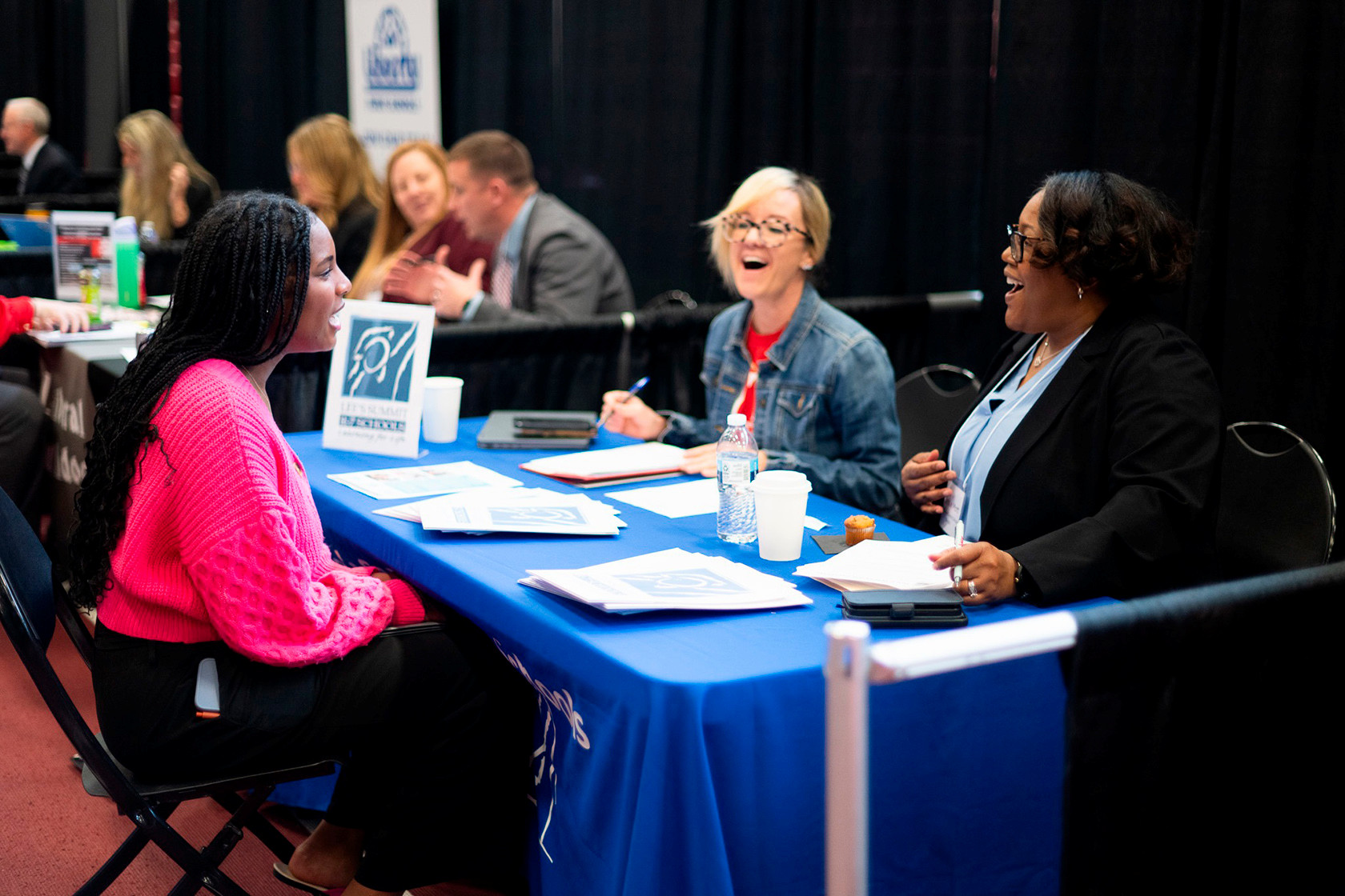 Student is being interviewed by potential employer in the Weede. 