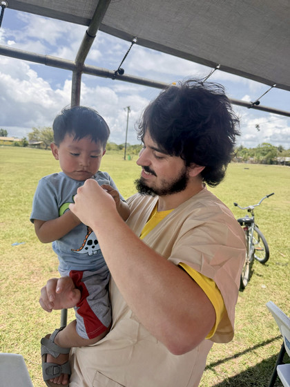Belize Adam with young patient