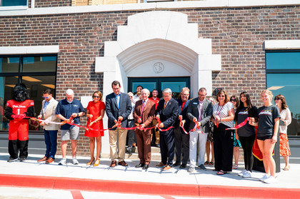 Besse ribbon cutting