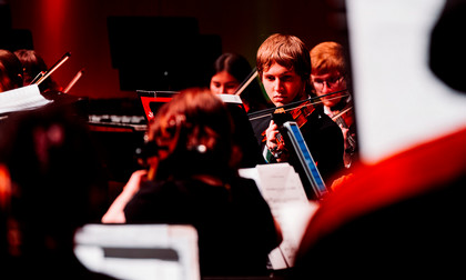 a violinist in the symphony