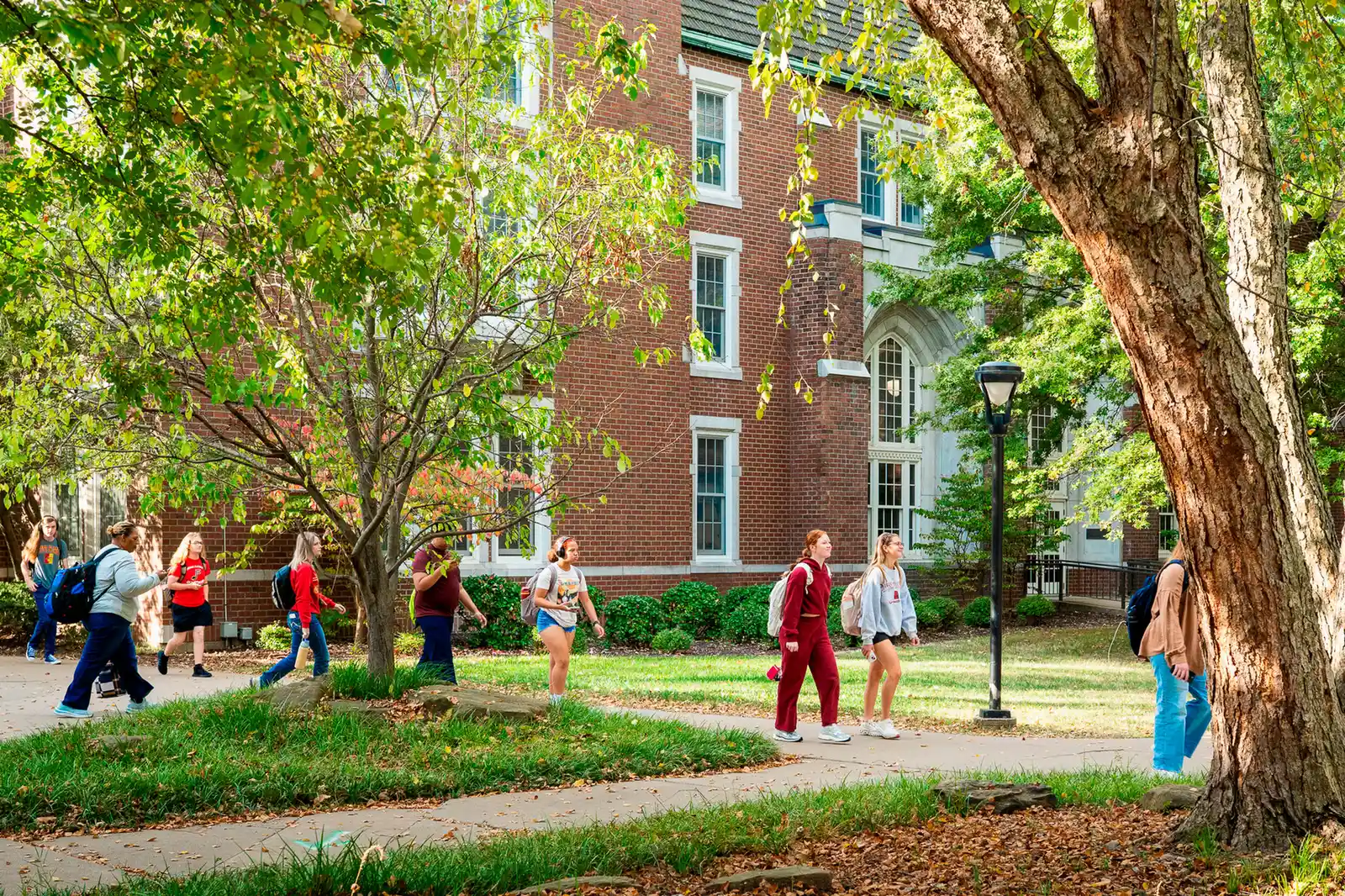 students walking on campus fall 1920w