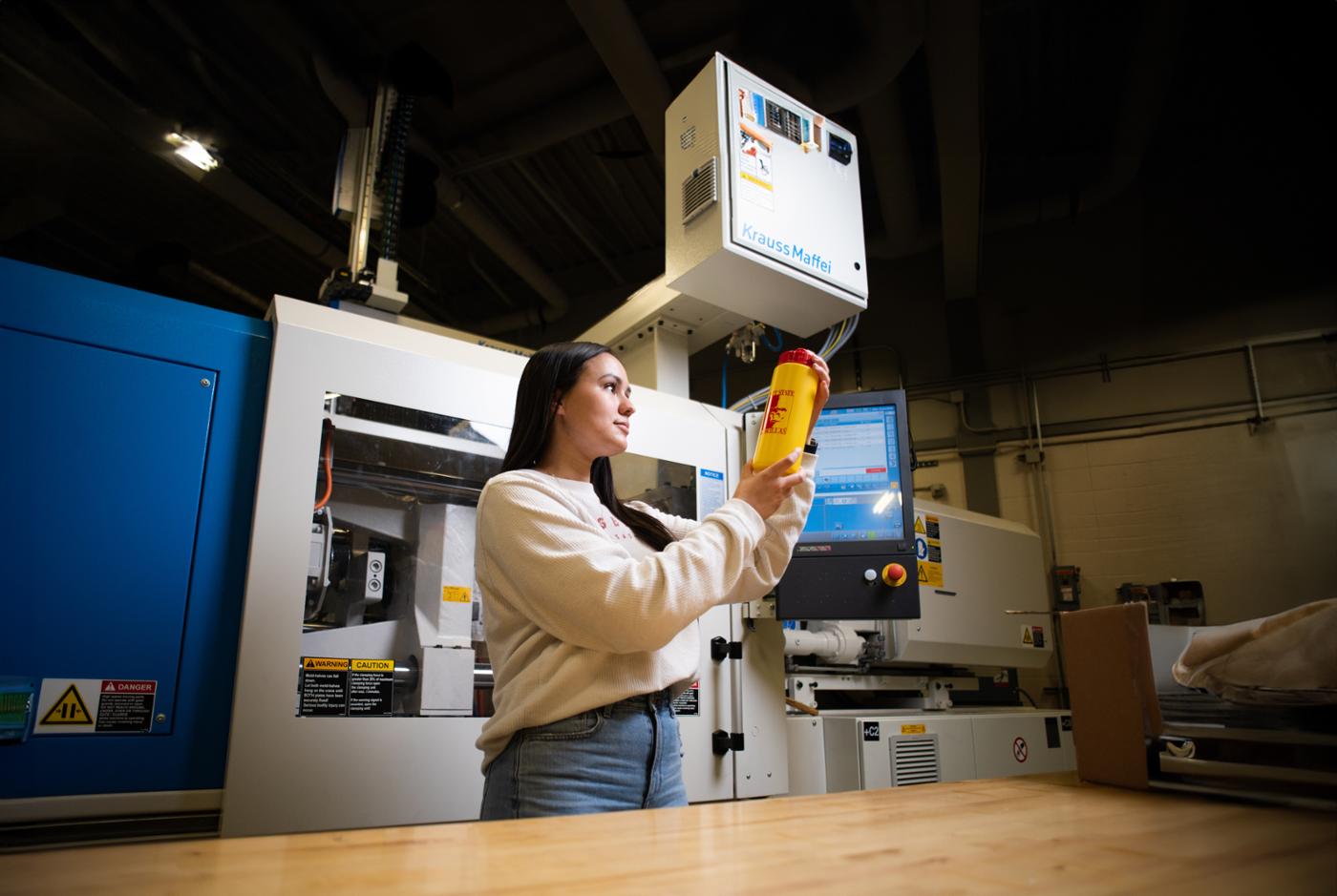 plastics engineering technology college student in Pitt State plastics lab