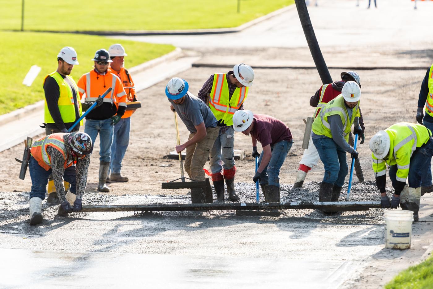 Pitt State college students working concrete lab for technology major at construction school