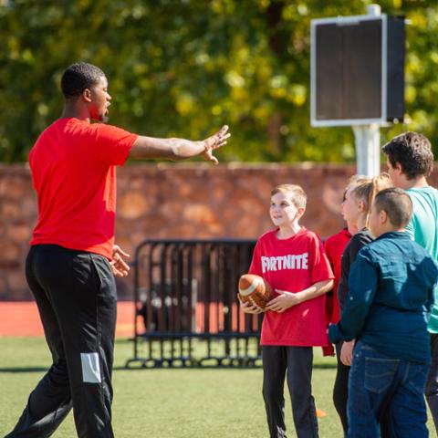 sport management major coaching elementary students at pitt state