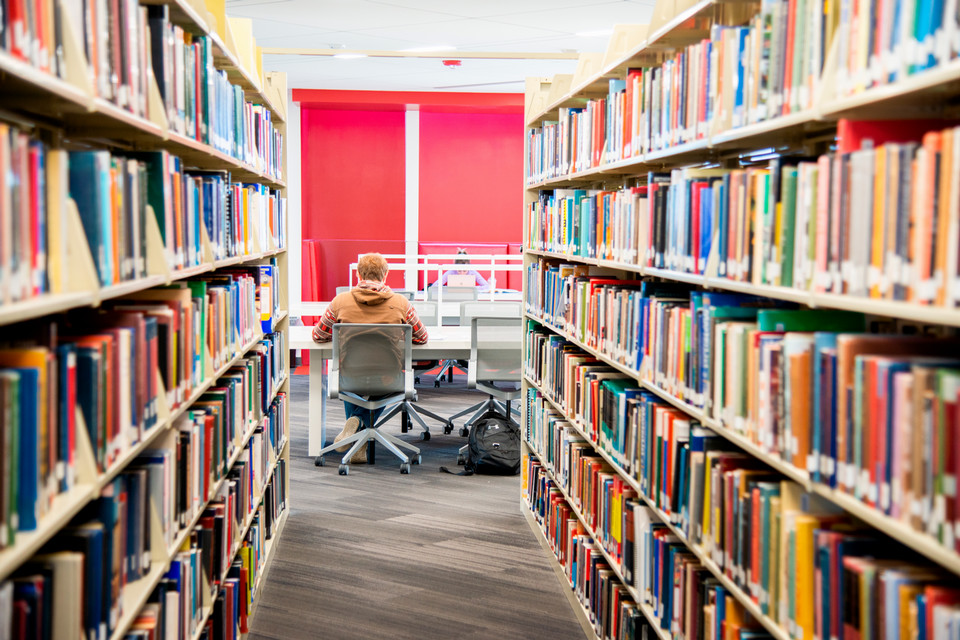student in library 960w