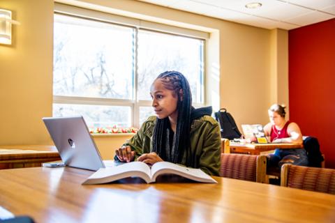 Psychology college student on computer at Pittsburg State